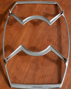A vintage polished steel table stretcher with a 'Tinsley & Co. Ltd.
